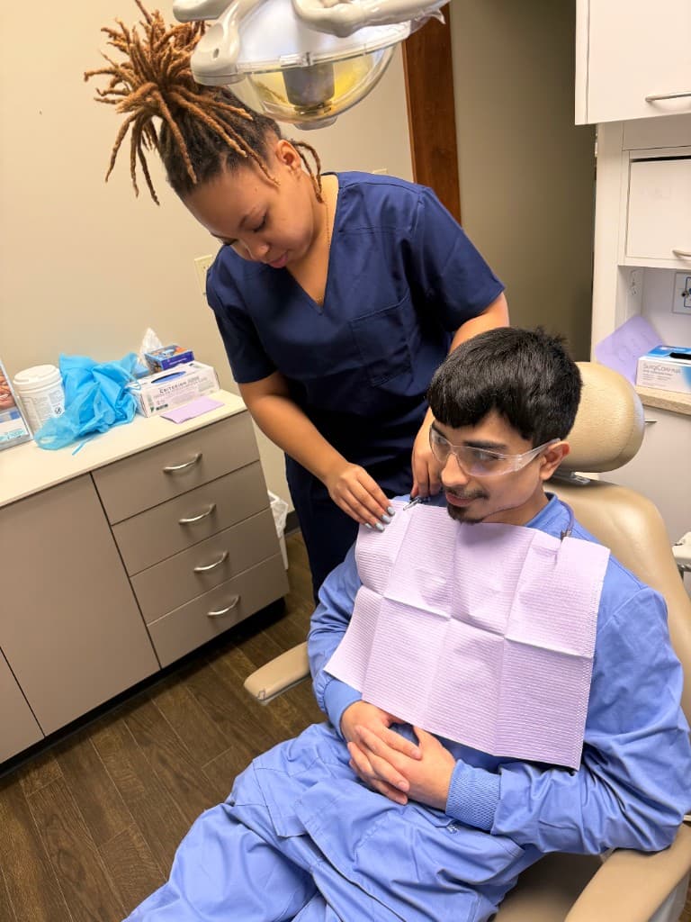 Dental professional providing patient care